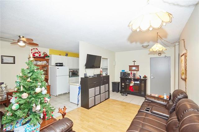 304 - 242 Oakdale Avenue, House attached with 2 bedrooms, 1 bathrooms and null parking in St. Catharines ON | Image 1