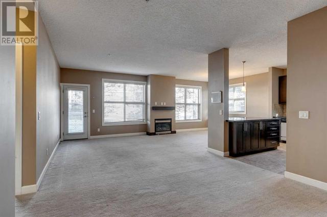 106, - 88 Arbour Lake Road Nw, Condo with 2 bedrooms, 2 bathrooms and 1 parking in Calgary AB | Image 3