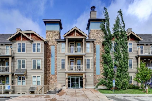 405, - 207 Sunset Drive, Condo with 2 bedrooms, 2 bathrooms and 1 parking in Cochrane AB | Card Image