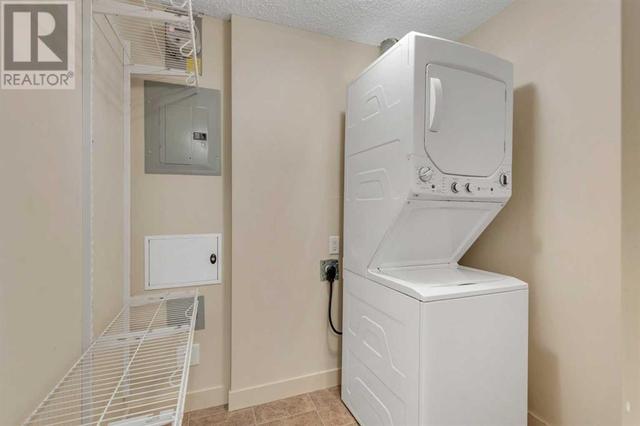 Convenient Laundry Area with Storage | Image 28