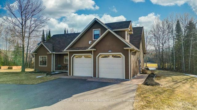 52 Nicklaus Dr, House detached with 2 bedrooms, 2 bathrooms and 12 parking in Bancroft ON | Image 1