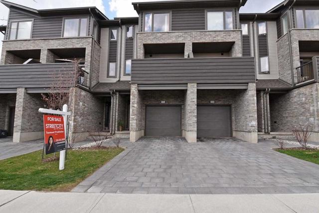 2052 Meadowgate Blvd, Townhouse with 3 bedrooms, 4 bathrooms and 2 parking in London ON | Image 1
