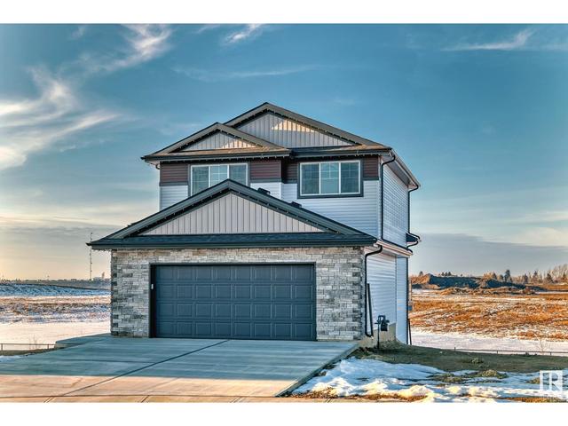 10206 92a Av, House detached with 3 bedrooms, 2 bathrooms and null parking in Morinville AB | Image 2