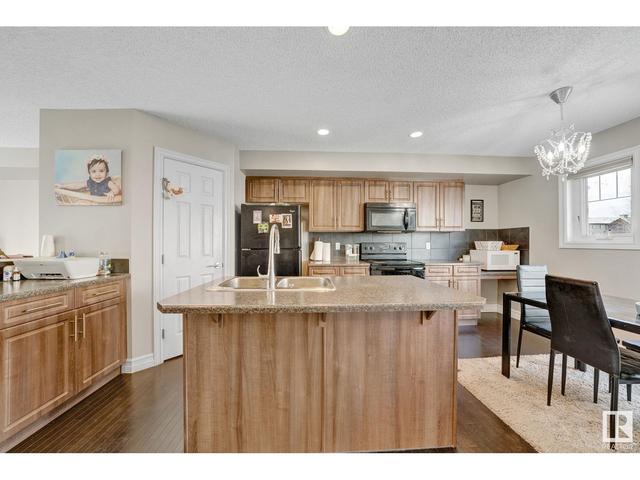 61 - 655 Tamarack Rd Nw, House attached with 3 bedrooms, 2 bathrooms and null parking in Edmonton AB | Image 14