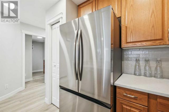 105, - 1718 14 Avenue Nw, Condo with 1 bedrooms, 1 bathrooms and 1 parking in Calgary AB | Image 11