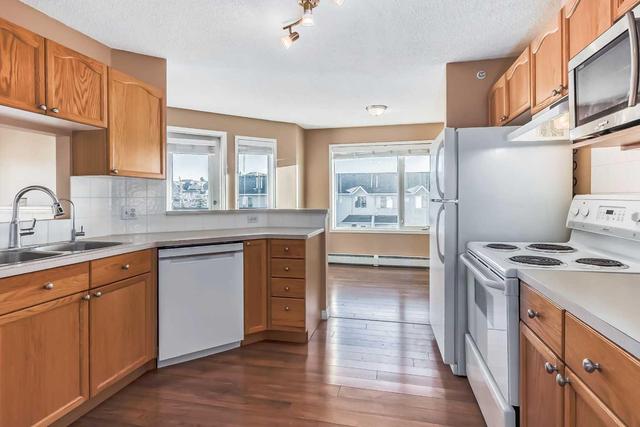1314 - 950 Arbour Lake Road Nw, Condo with 2 bedrooms, 2 bathrooms and 1 parking in Calgary AB | Image 7