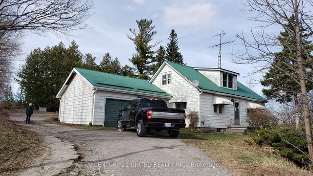 2235 Burnham Line, House detached with 3 bedrooms, 1 bathrooms and 4 parking in Otonabee South Monaghan ON | Image 1
