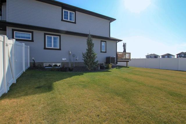 76 Latoria Court, Home with 3 bedrooms, 2 bathrooms and 3 parking in Red Deer County AB | Image 40
