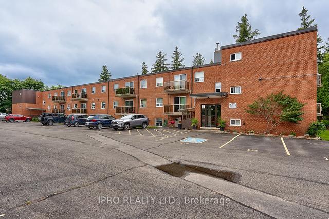 101 - 24 Ransom St, Condo with 2 bedrooms, 1 bathrooms and 1 parking in Halton Hills ON | Image 1