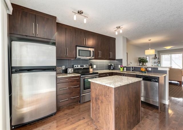 35 Aspen Hills Drive Sw, Home with 3 bedrooms, 3 bathrooms and 1 parking in Calgary AB | Image 16