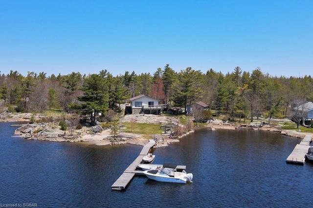 27142 Georgian Bay Shore, House detached with 3 bedrooms, 1 bathrooms and null parking in Georgian Bay ON | Image 2
