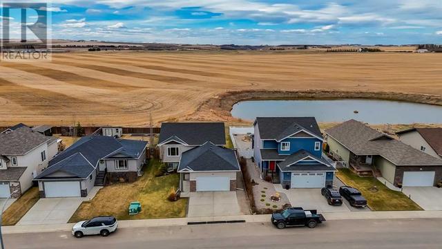 667 West Highland Crescent, House detached with 4 bedrooms, 3 bathrooms and 4 parking in Carstairs AB | Image 41