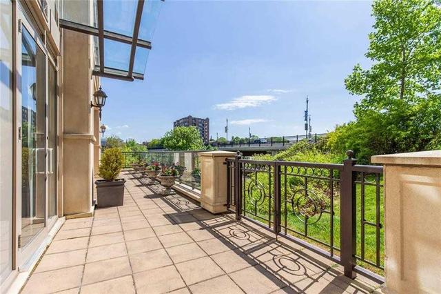 201 - 111 Forsythe St, Condo with 2 bedrooms, 2 bathrooms and 1 parking in Oakville ON | Image 28