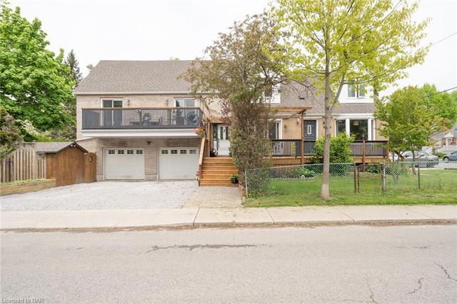 82 Natal Avenue, House detached with 5 bedrooms, 2 bathrooms and 11 parking in Toronto ON | Card Image