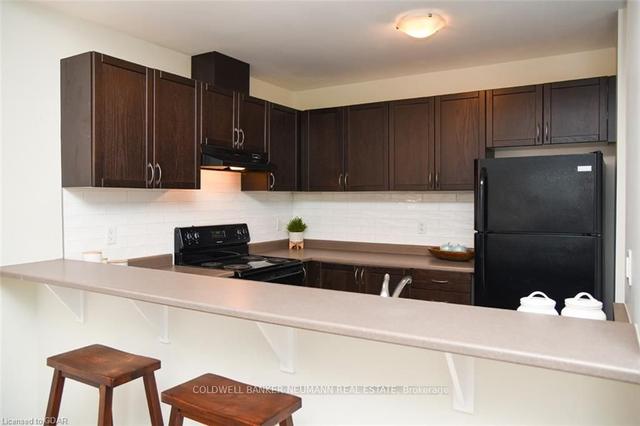209 - 2 Colonial Dr, Condo with 2 bedrooms, 2 bathrooms and 2 parking in Guelph ON | Image 2
