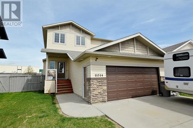 11314 71 Avenue, House detached with 4 bedrooms, 3 bathrooms and 2 parking in Grande Prairie AB | Card Image