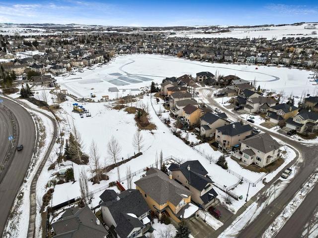 12 Crystal Shores Cove, Home with 2 bedrooms, 2 bathrooms and 2 parking in Calgary AB | Image 34