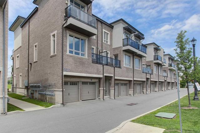 13 - 9621 Jane St, Townhouse with 2 bedrooms, 2 bathrooms and 1 parking in Vaughan ON | Image 1