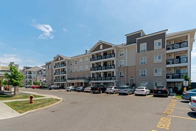 408 - 1045 Nadalin Hts, Condo with 2 bedrooms, 2 bathrooms and 2 parking in Milton ON | Image 1