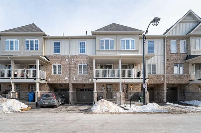 90 - 88 Decorso Dr, House attached with 2 bedrooms, 3 bathrooms and 2 parking in Guelph ON | Image 1