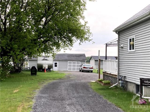 1799 Route 200 Route, House detached with 2 bedrooms, 1 bathrooms and 10 parking in The Nation ON | Image 4