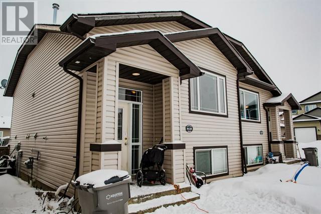 9125 131 Avenue, House semidetached with 4 bedrooms, 2 bathrooms and 2 parking in Grande Prairie AB | Card Image