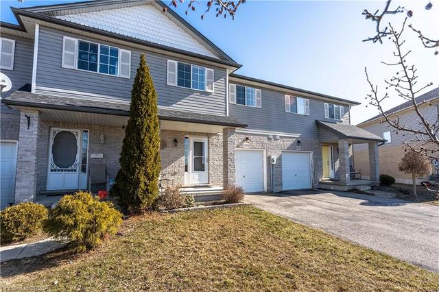121b Whitlaw Way, House attached with 3 bedrooms, 2 bathrooms and 3 parking in Brant ON | Image 2