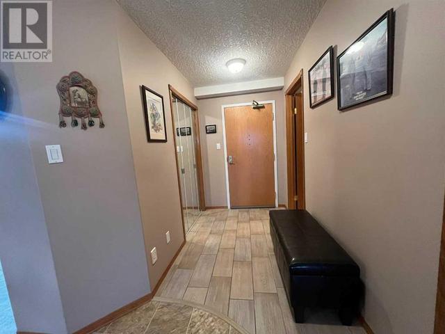 107, - 100 2 Avenue S, Condo with 2 bedrooms, 2 bathrooms and 1 parking in Lethbridge AB | Image 2
