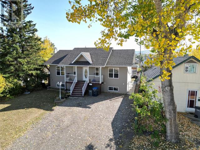 1437 104 Avenue, House detached with 4 bedrooms, 2 bathrooms and 6 parking in Dawson Creek BC | Image 3