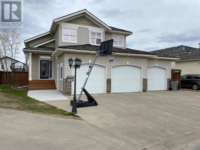 10206 72 Avenue, House detached with 5 bedrooms, 3 bathrooms and 7 parking in Grande Prairie AB | Card Image