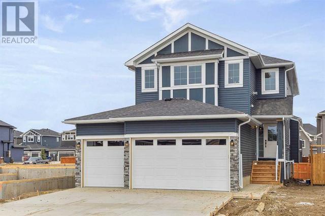1347 Scarlett Ranch Boulevard, House detached with 3 bedrooms, 2 bathrooms and 6 parking in Carstairs AB | Image 1