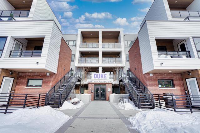 319 - 120 18 Avenue Sw, Condo with 2 bedrooms, 2 bathrooms and 1 parking in Calgary AB | Image 1
