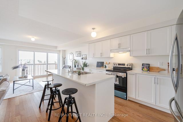 128 Sailors Landing, House attached with 3 bedrooms, 4 bathrooms and 2 parking in Clarington ON | Image 40