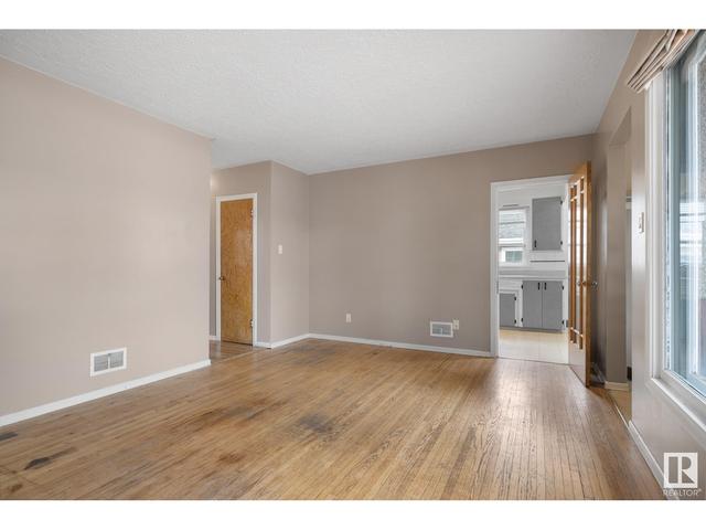11112/11116 116 St Nw Nw, House attached with 2 bedrooms, 4 bathrooms and null parking in Edmonton AB | Image 11