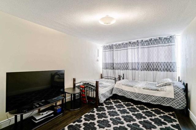 1607 - 11 Wincott Dr, Condo with 3 bedrooms, 2 bathrooms and 1 parking in Toronto ON | Image 14