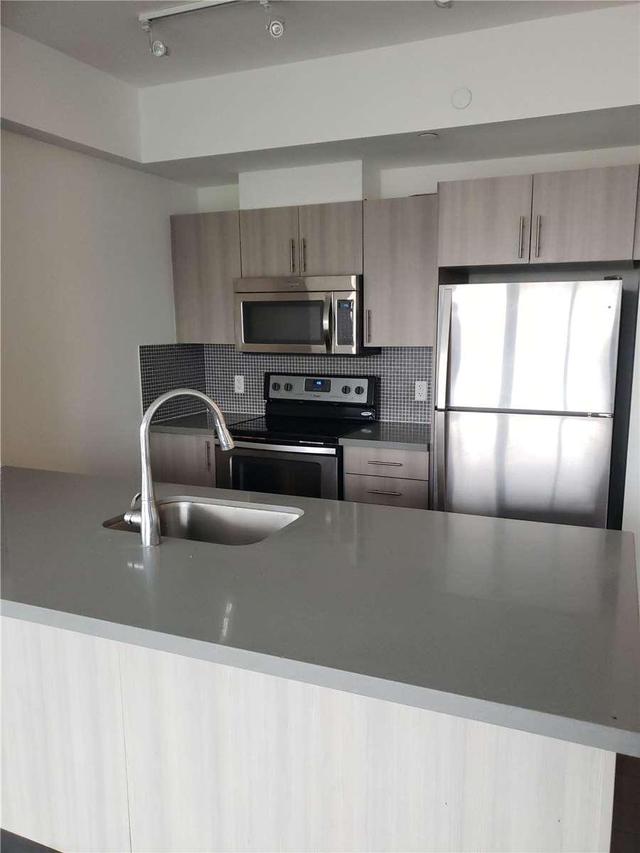 203 - 16 Mcadam Ave, Condo with 2 bedrooms, 2 bathrooms and 1 parking in Toronto ON | Image 1