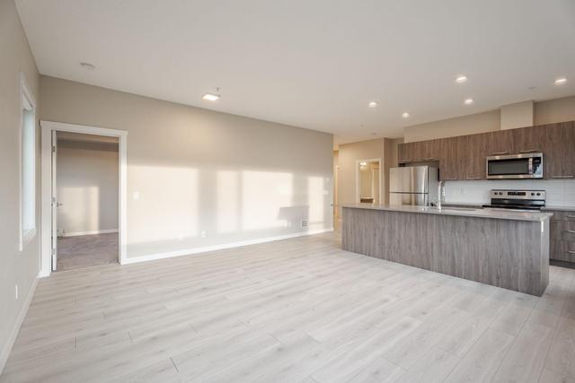 216 - 214 Sherwood Square Nw, Condo with 2 bedrooms, 2 bathrooms and 2 parking in Calgary AB | Image 12