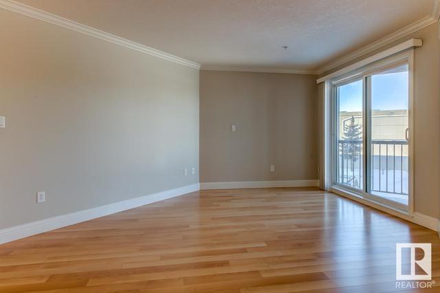 213 - 13111 140 Av Nw, Condo with 2 bedrooms, 2 bathrooms and 2 parking in Edmonton AB | Image 3