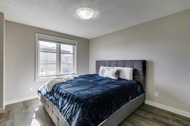 35 Aspen Hills Green Sw, Home with 2 bedrooms, 2 bathrooms and 2 parking in Calgary AB | Image 26