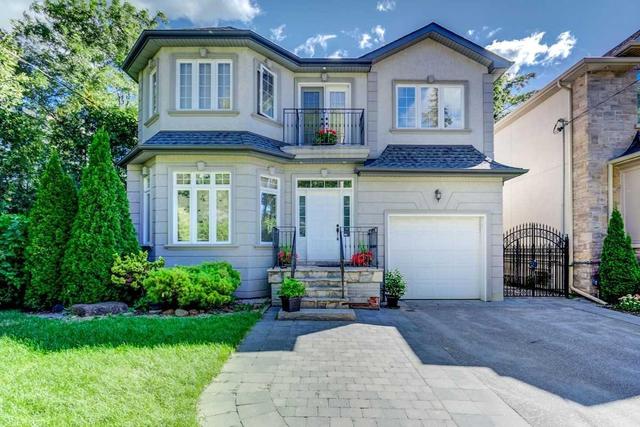 11 Monkton Ave, House detached with 4 bedrooms, 5 bathrooms and 4 parking in Toronto ON | Image 1
