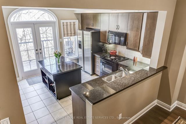 23 Leaves Terr, House attached with 3 bedrooms, 3 bathrooms and 2 parking in Toronto ON | Image 4