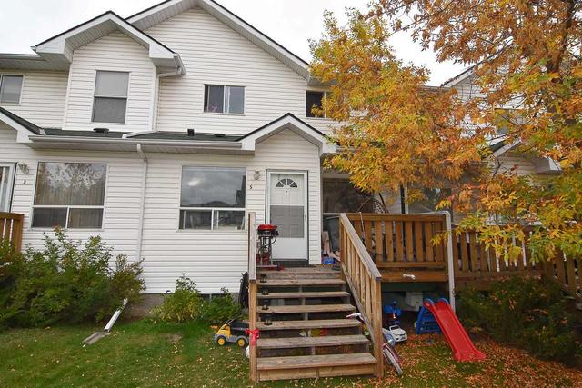 5 Sandpiper Link Nw, Home with 3 bedrooms, 1 bathrooms and 2 parking in Calgary AB | Image 4