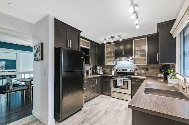 12 - 27 Silver Springs Drive Nw, Home with 3 bedrooms, 2 bathrooms and 2 parking in Calgary AB | Image 7
