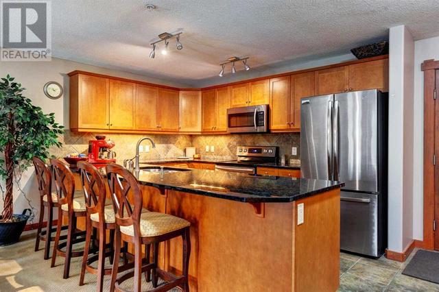 201, - 170 Crossbow Place, Condo with 2 bedrooms, 2 bathrooms and 1 parking in Canmore AB | Image 6