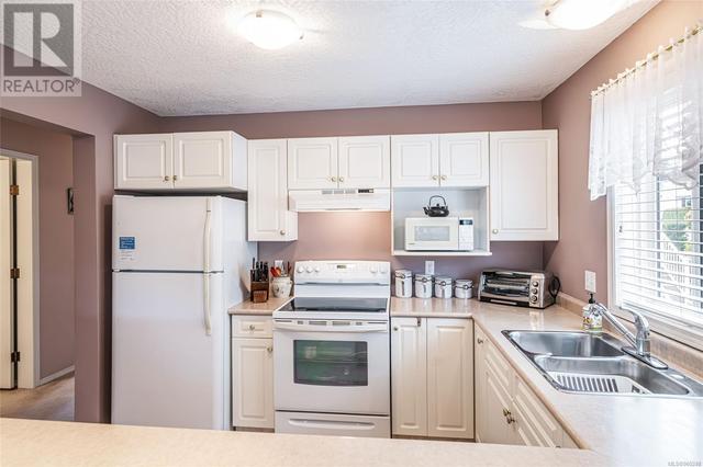 103 - 1150 Walkem Rd, House attached with 2 bedrooms, 2 bathrooms and 1 parking in Ladysmith BC | Image 3