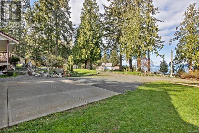 6249 Island Hwy, House detached with 3 bedrooms, 3 bathrooms and 8 parking in Comox Valley A BC | Image 10