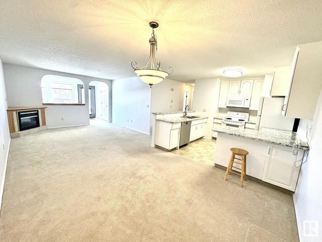206 - 4604 48a St, Condo with 2 bedrooms, 1 bathrooms and null parking in Leduc AB | Image 4