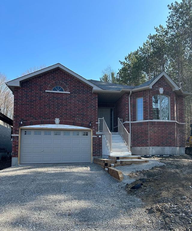 31 Revol Rd S, House detached with 3 bedrooms, 2 bathrooms and 4 parking in Penetanguishene ON | Image 1