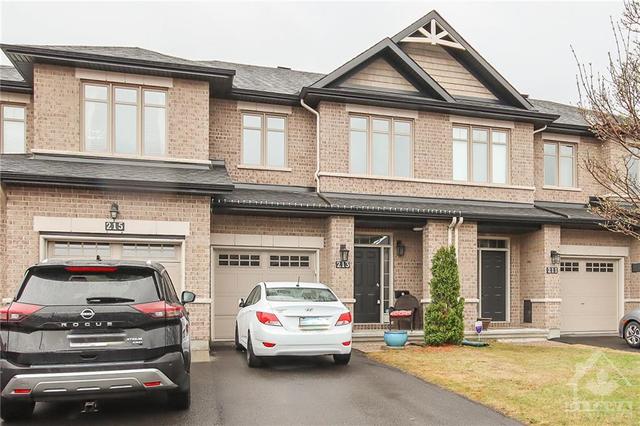 213 Butterfly Walk, Townhouse with 3 bedrooms, 2 bathrooms and 3 parking in Ottawa ON | Image 1