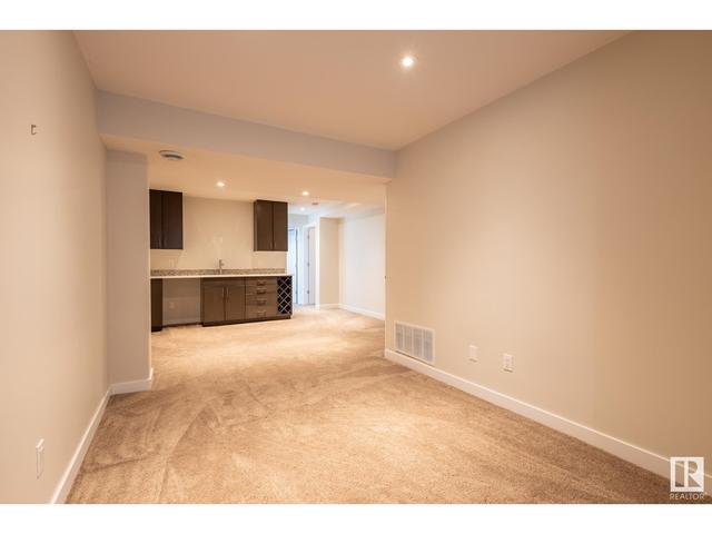 7551 80 Av Nw, House semidetached with 4 bedrooms, 4 bathrooms and null parking in Edmonton AB | Image 47